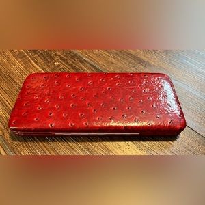 Red clutch/wallet. Faux ostrich embossing.